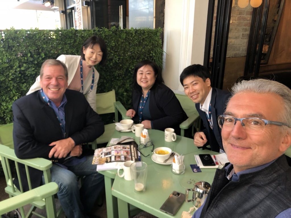 Tim and group hanging out at MIPCOM 2022